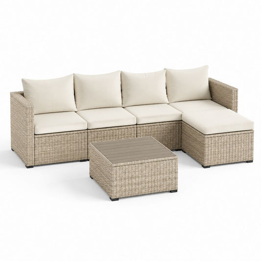 Set divano da giardino angolare beige in rattan PE con cuscini color crema e tavolino 250 x 190 cm